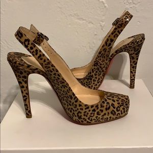 Christian Louboutin patent leather pumps